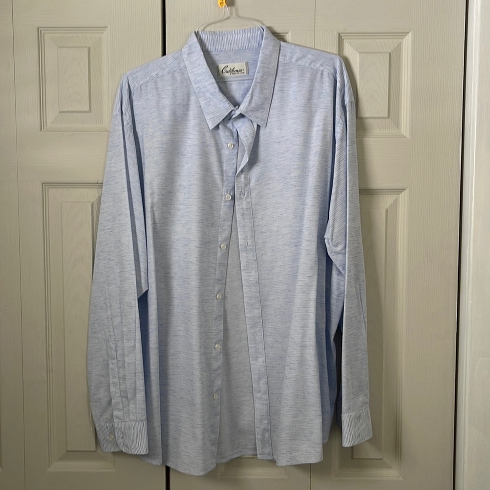 Never worn. Dry cleaned. Too big after weight loss.